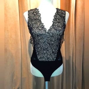 Timing lace bodysuit